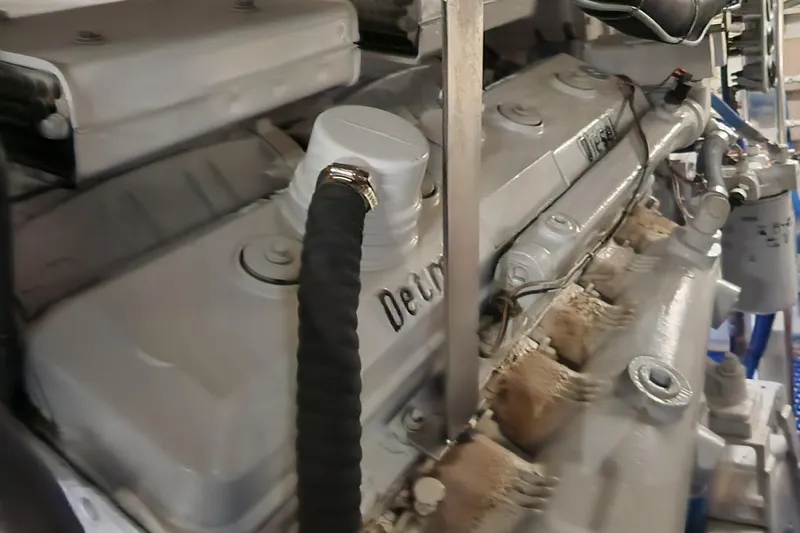 Miss Phebe II Yacht Photos Pics 1971 Whiticar Sportfish engine close-up, showcasing mechanical components and details.