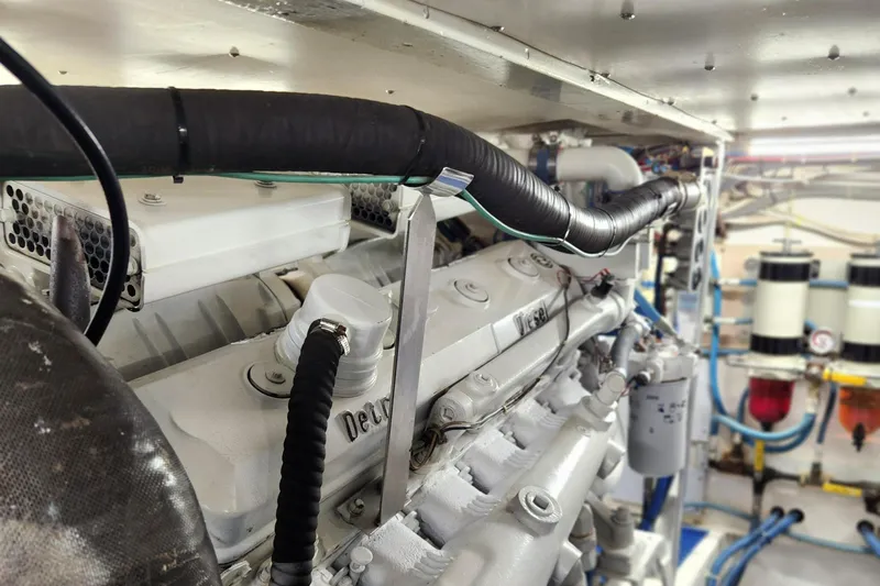 Miss Phebe II Yacht Photos Pics Engine room of a 1971 Whiticar Sportfish boat, showcasing detailed mechanical components.