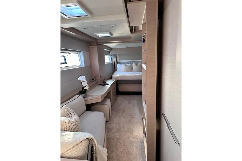  Yacht Photos Pics Luxurious interior of 2021 Lagoon 50 yacht with cozy seating and elegant decor.