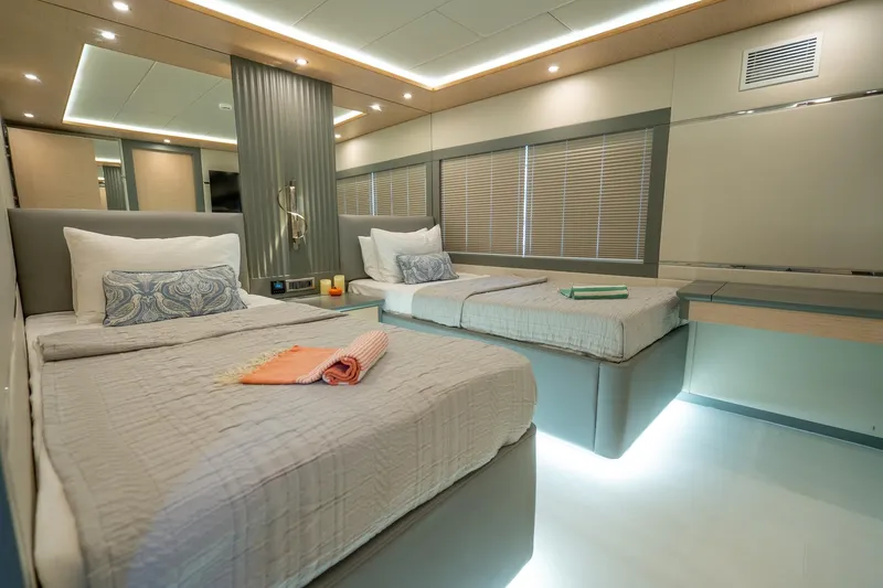  Yacht Photos Pics Luxurious cabin interior of 2024 Custom 27m Trawler with twin beds and modern decor.