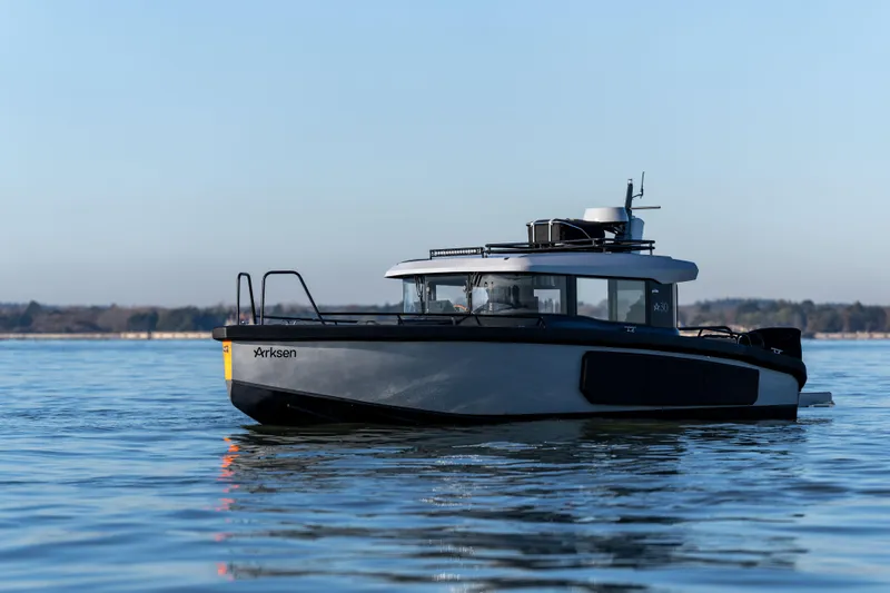  Yacht Photos Pics Arksen 30 boat on calm water, 2025 model, side view.