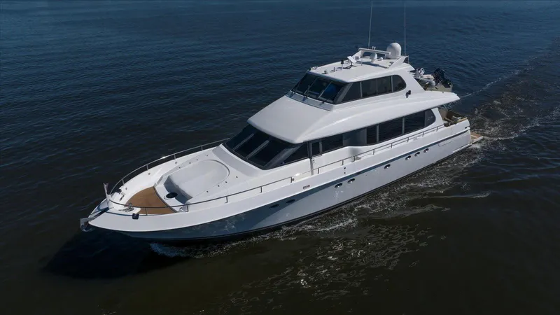 Octopi Yacht Photos Pics 1997 Lazzara EB 76 yacht cruising on open water.