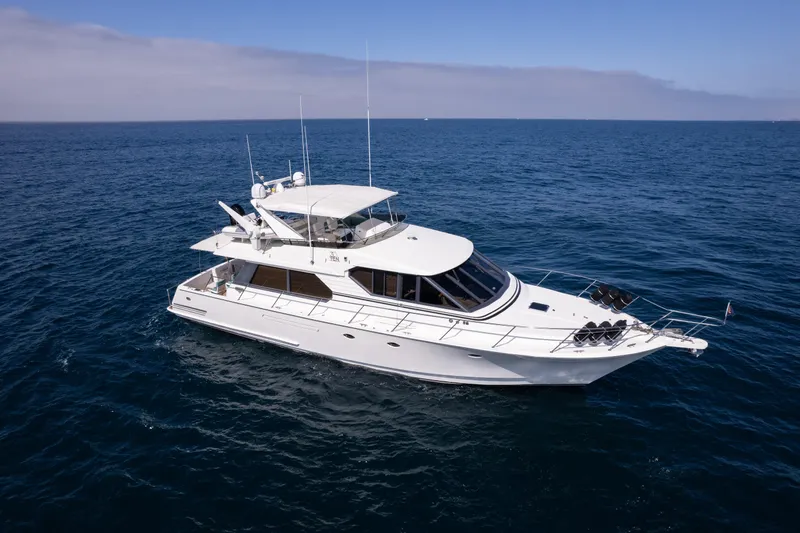 3ten Yacht Photos Pics 1997 West Bay Sonship yacht cruising on open ocean under clear skies.