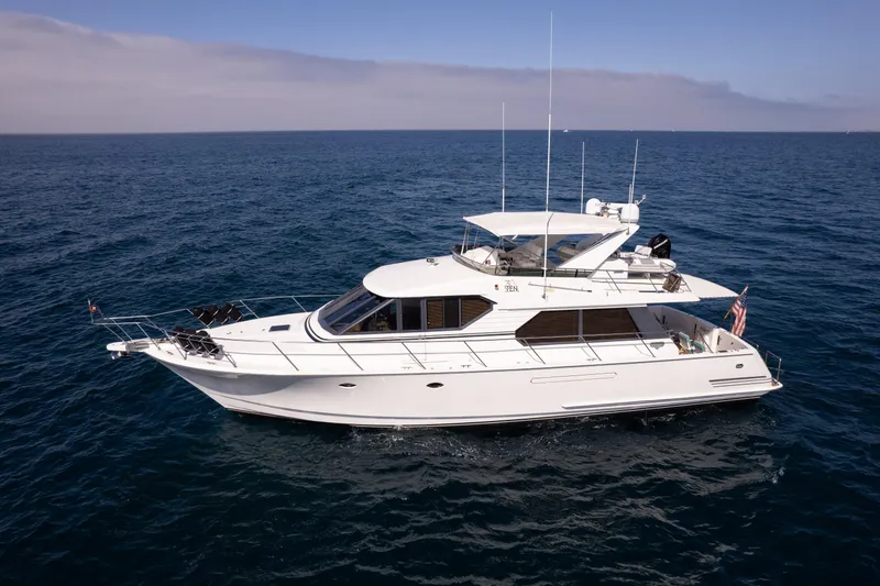 3ten Yacht Photos Pics 1997 West Bay Sonship yacht cruising on open sea under clear skies.