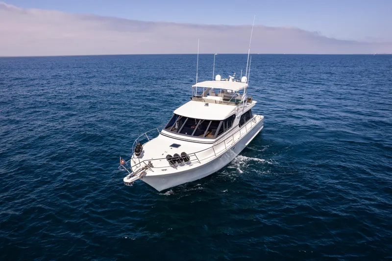 3ten Yacht Photos Pics 1997 West Bay Sonship yacht cruising on open sea under clear skies.