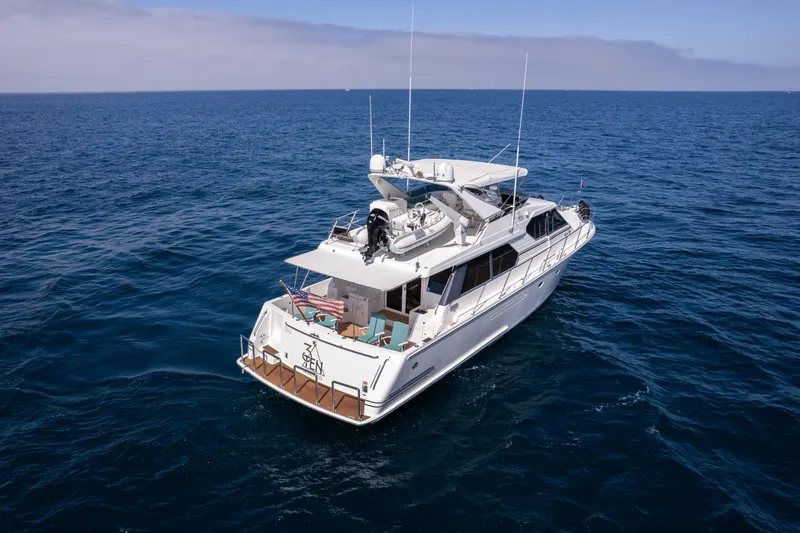 3ten Yacht Photos Pics 1997 West Bay Sonship yacht cruising on open ocean waters.