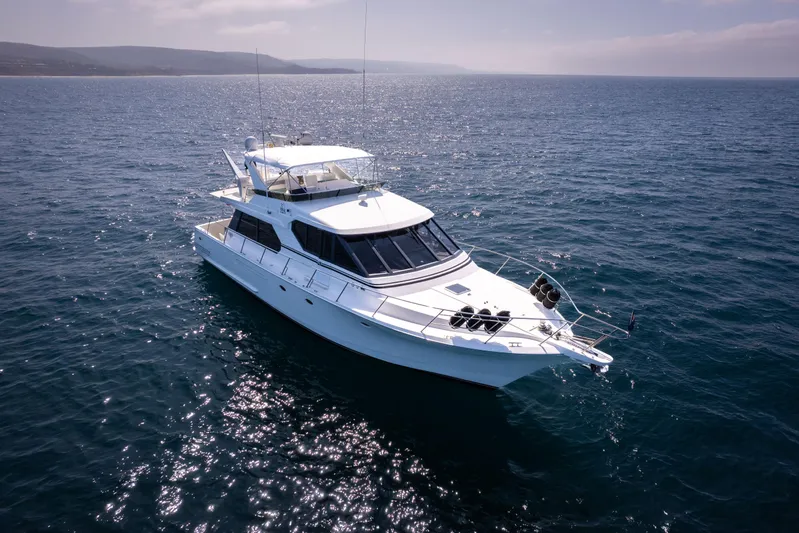 3ten Yacht Photos Pics 1997 West Bay Sonship yacht cruising on open sea under clear skies.