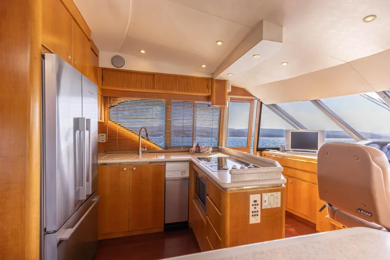 3ten Yacht Photos Pics Luxurious 1997 West Bay Sonship yacht kitchen with modern appliances and ocean view.