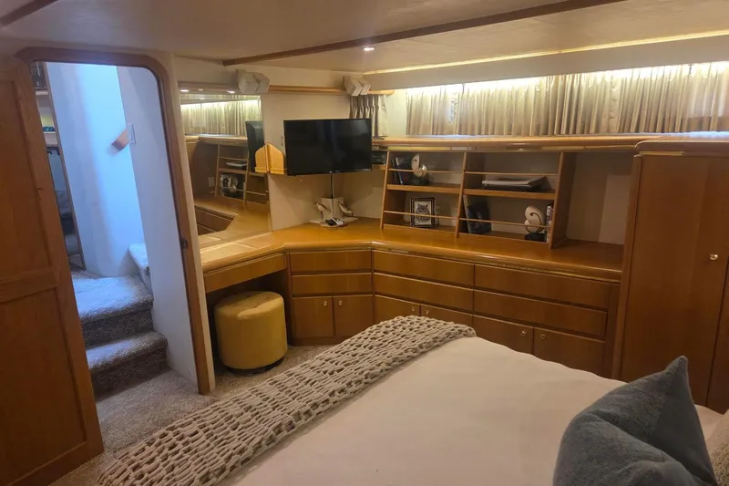 3ten Yacht Photos Pics Luxurious 1997 West Bay Sonship yacht interior with wood cabinetry and modern amenities.