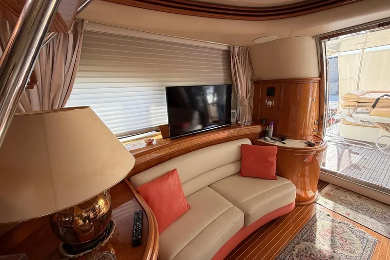  Yacht Photos Pics Luxurious interior of 2007 Azimut 68 EVO yacht with elegant seating and modern amenities.