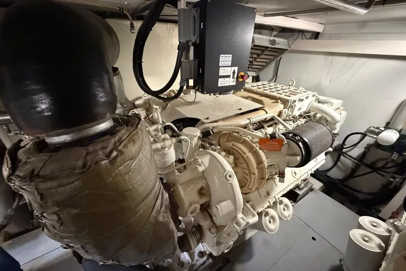  Yacht Photos Pics Engine room of 2007 Azimut 68 EVO yacht, showcasing detailed machinery components.