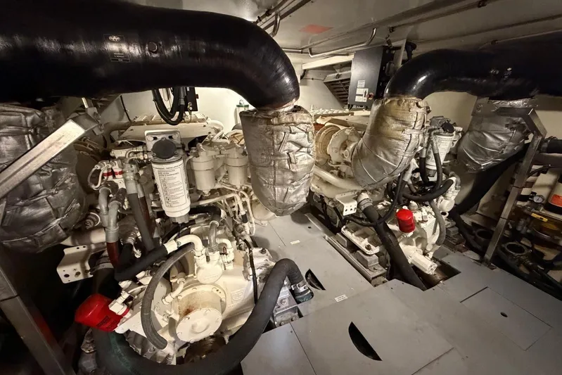  Yacht Photos Pics Engine room of 2007 Azimut 68 EVO yacht, featuring complex machinery and piping.