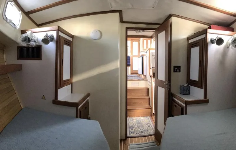  Yacht Photos Pics 2007 Duffy Aft Cabin interior with twin beds and wooden accents.