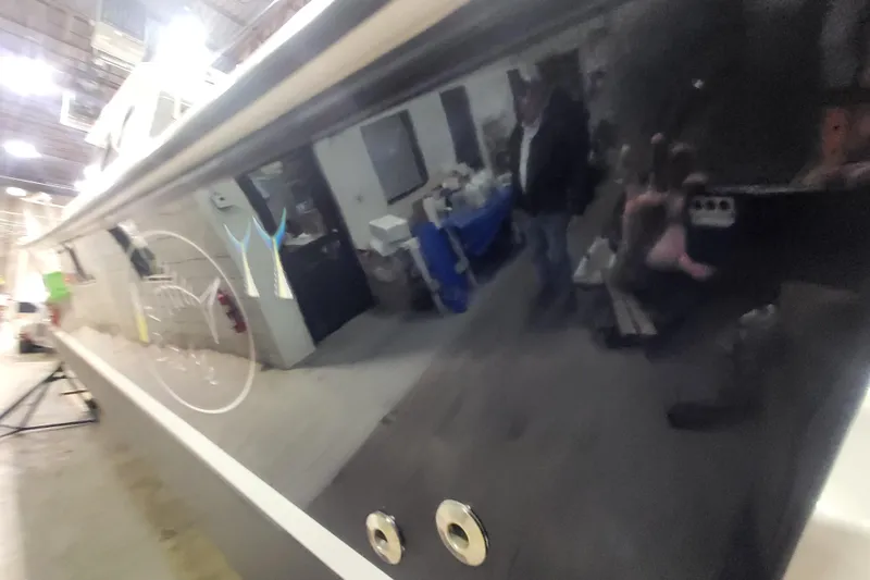  Yacht Photos Pics 2020 Steiger Craft 31 Miami boat in a workshop, reflecting surroundings.