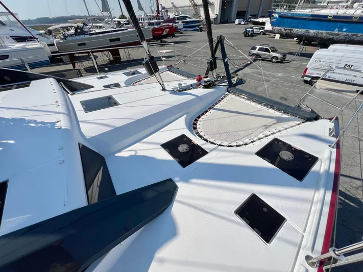 Rogue Yacht Photos Pics Deck view of a 2021 Privilege 510 catamaran in a marina setting.