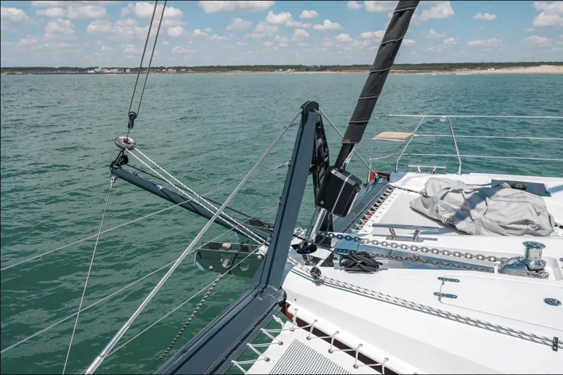 Rogue Yacht Photos Pics Sailing catamaran Privilege 510, 2021 model, on calm sea with clear sky.