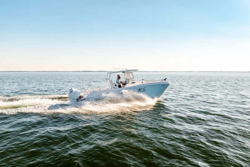 Endless Bs Yacht Photos Pics 2023 Twin Vee 260 GFX CC boat cruising on open water under clear skies.