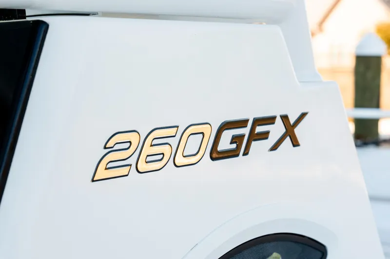 Endless Bs Yacht Photos Pics Close-up of 2023 Twin Vee 260 GFX CC boat model emblem.