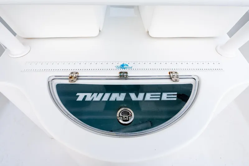 Endless Bs Yacht Photos Pics 2023 Twin Vee 260 GFX CC boat detail with logo and measuring ruler.