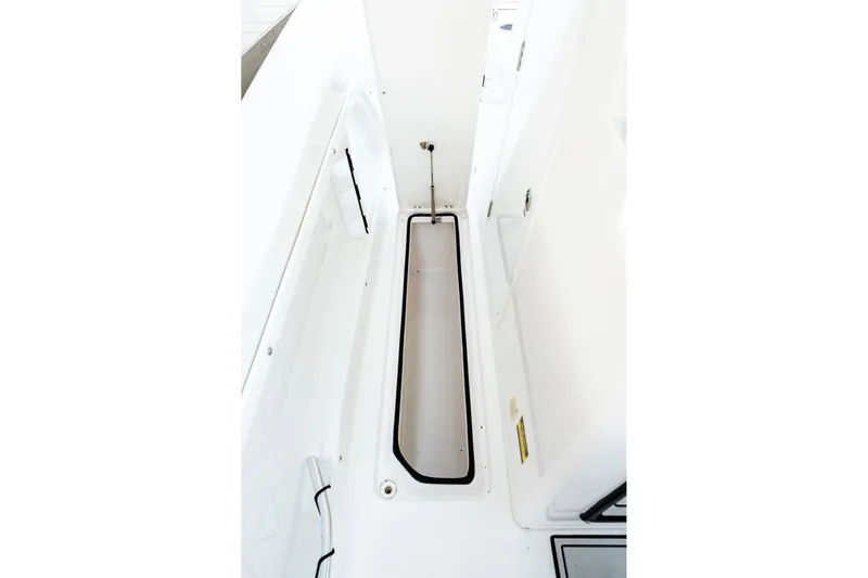 Endless Bs Yacht Photos Pics 2023 Twin Vee 260 GFX CC boat interior storage compartment.