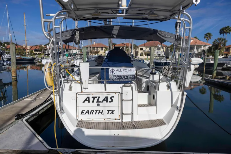 Atlas Yacht Photos Pics Jeanneau Sun Odyssey 43 DS yacht docked, rear view, 2001 model, marina setting.
