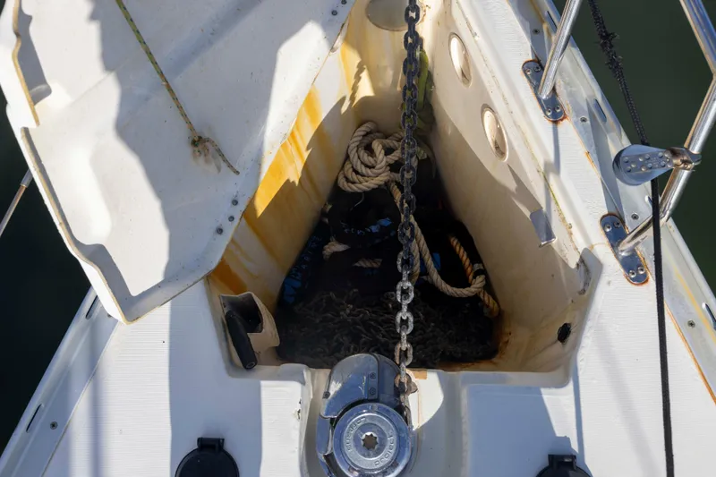 Atlas Yacht Photos Pics Anchor locker of 2001 Jeanneau Sun Odyssey 43 DS sailboat with chain and ropes.
