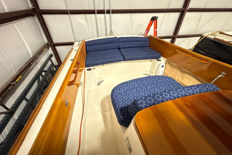 Manitou Yacht Photos Pics Interior of a 2004 Hinckley 36 Picnic Boat EP with blue patterned seating.