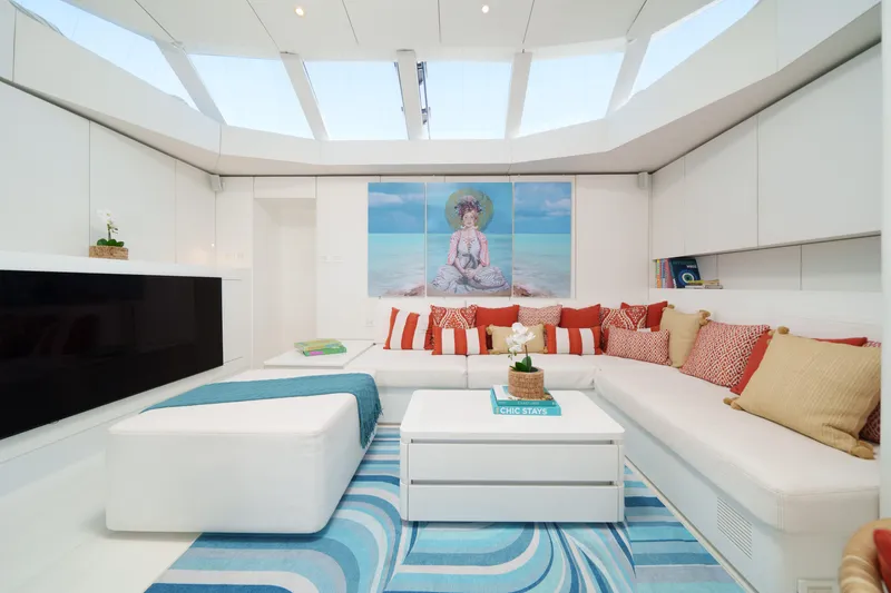 Royal Rita Yacht Photos Pics Luxurious Sunreef 70 yacht interior, featuring modern white and blue decor, 2016 model.