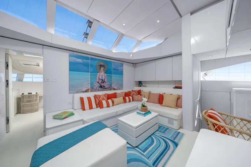 Royal Rita Yacht Photos Pics Luxurious interior of 2016 Sunreef 70 yacht with modern decor and skylights.