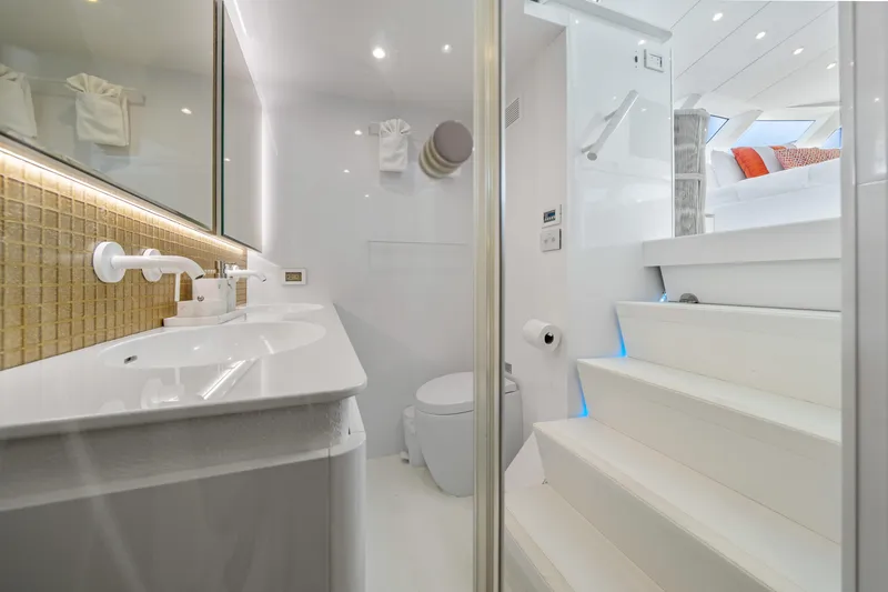 Royal Rita Yacht Photos Pics Luxurious bathroom interior on 2016 Sunreef 70 yacht, featuring modern fixtures and elegant design.