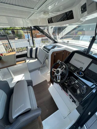  Yacht Photos Pics Interior of 2021 Jeanneau 895 boat with Garmin navigation system.
