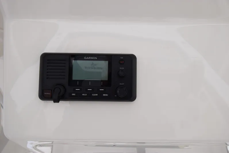 Shore Runner Yacht Photos Pics Garmin marine radio on 2021 Regulator 34 boat dashboard.