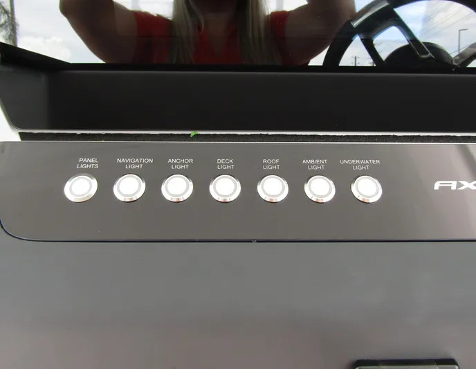  Yacht Photos Pics Control panel of 2024 Axopar 37 Sun Top with labeled light switches.