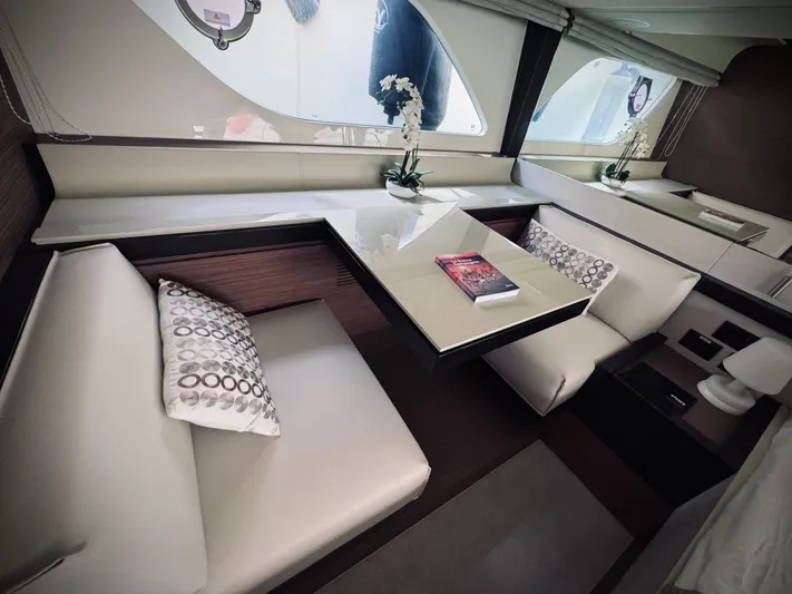  Yacht Photos Pics Luxurious interior of 2016 Ferretti Yachts 550 with elegant seating and modern decor.