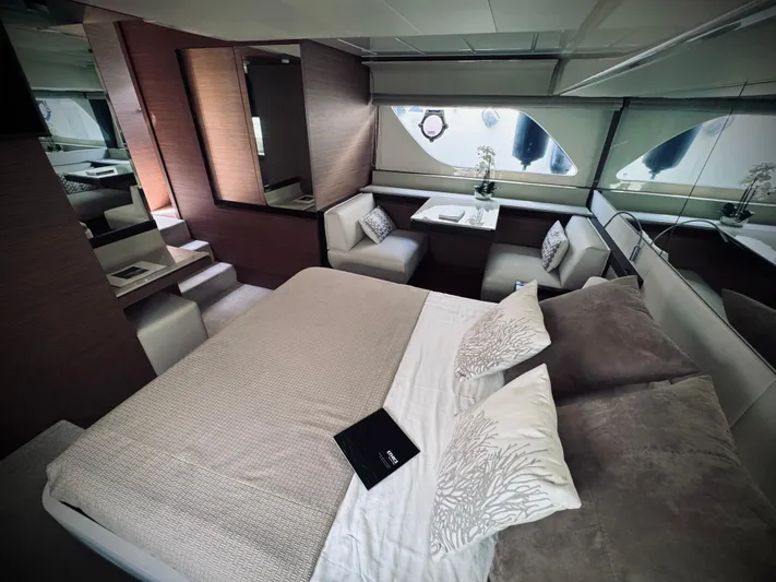 Yacht Photos Pics Luxurious interior of 2016 Ferretti Yachts 550 with elegant bedroom and seating area.