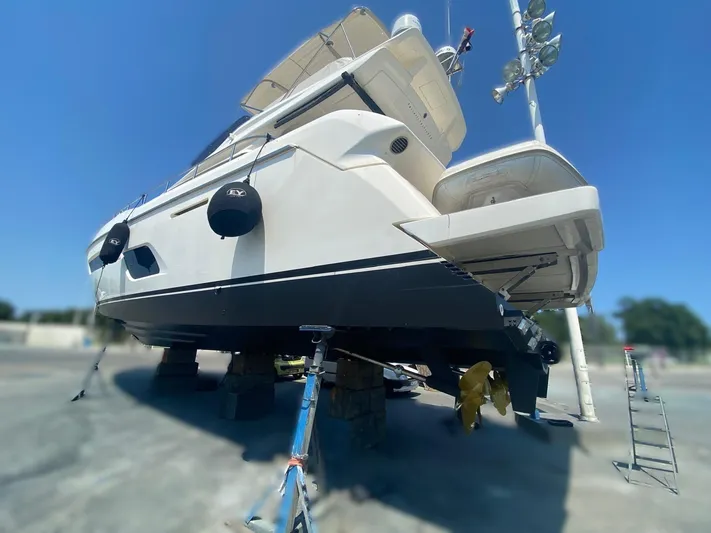  Yacht Photos Pics 2016 Ferretti Yachts 550 on dry dock, showcasing sleek design and modern features.