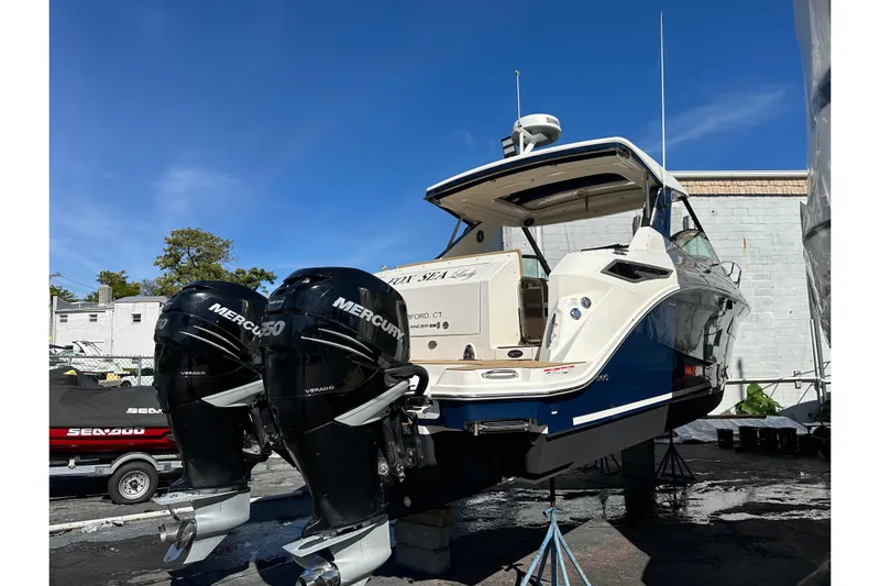  Yacht Photos Pics 2020 Sea Ray Sundancer 320 with twin Mercury Verado engines, displayed outdoors.