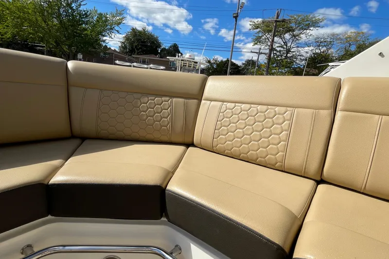  Yacht Photos Pics Luxurious seating on 2020 Sea Ray Sundancer 320 boat, featuring honeycomb-patterned upholstery.