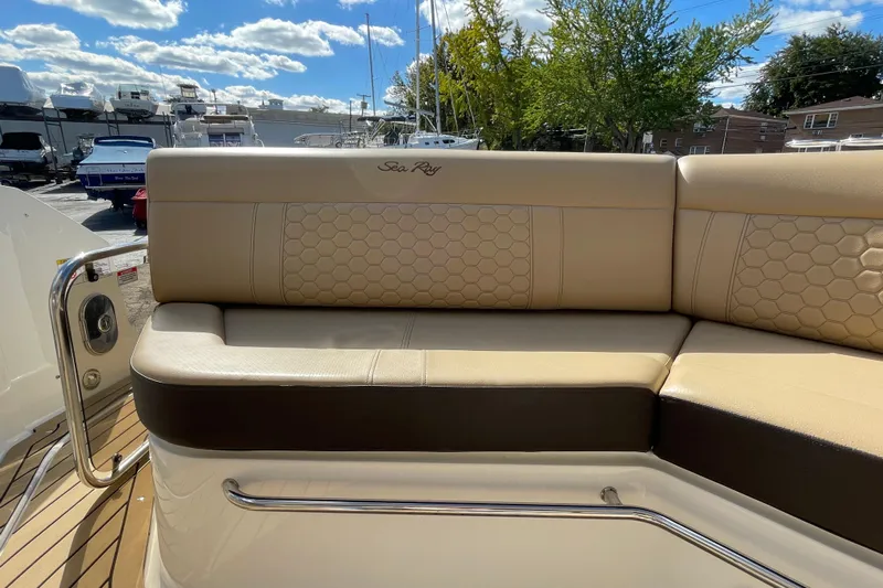  Yacht Photos Pics Luxurious seating on 2020 Sea Ray Sundancer 320 yacht, featuring elegant beige upholstery.