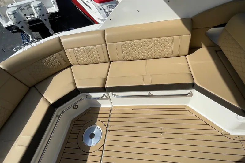  Yacht Photos Pics Luxurious seating area on 2020 Sea Ray Sundancer 320 boat with tan upholstery.