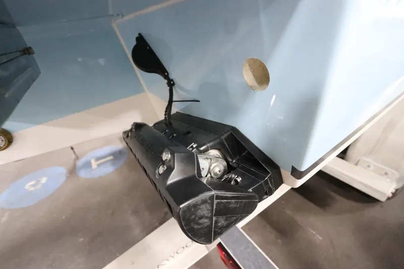  Yacht Photos Pics 2024 SeaCraft 23CC boat transom with mounted equipment, close-up view.