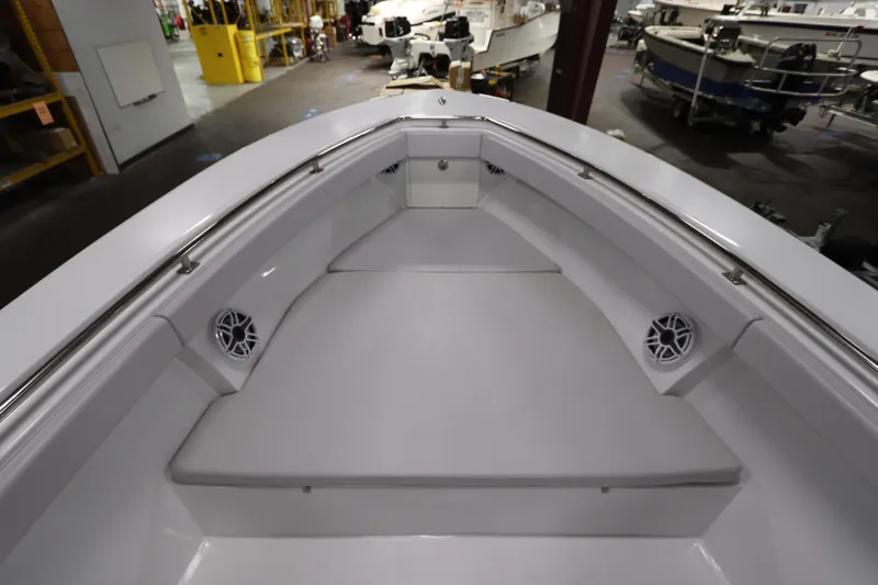  Yacht Photos Pics 2024 SeaCraft 23CC boat interior with spacious seating and modern design.