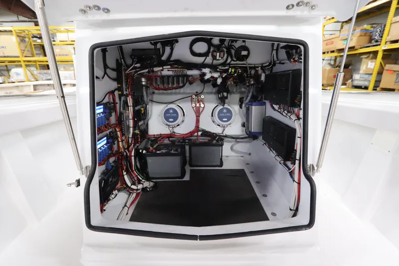  Yacht Photos Pics 2024 SeaCraft 23CC boat electrical compartment with wiring and components.