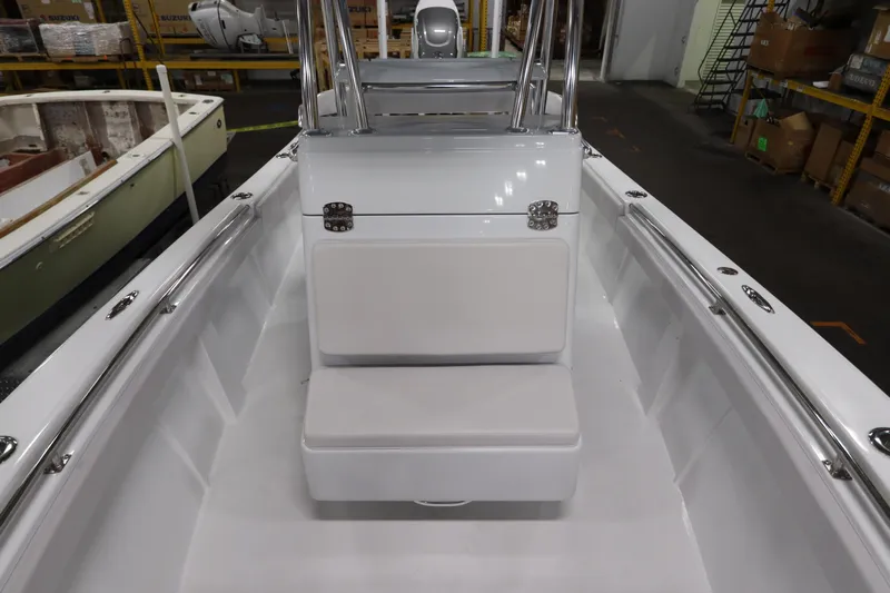  Yacht Photos Pics 2024 SeaCraft 23CC boat interior with white seating and stainless steel fittings.