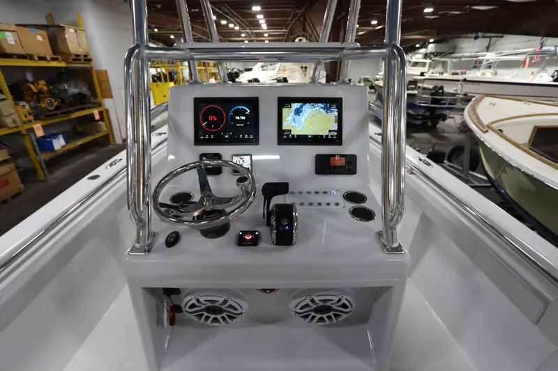 Yacht Photos Pics 2024 SeaCraft 23CC boat dashboard with modern navigation and control systems.