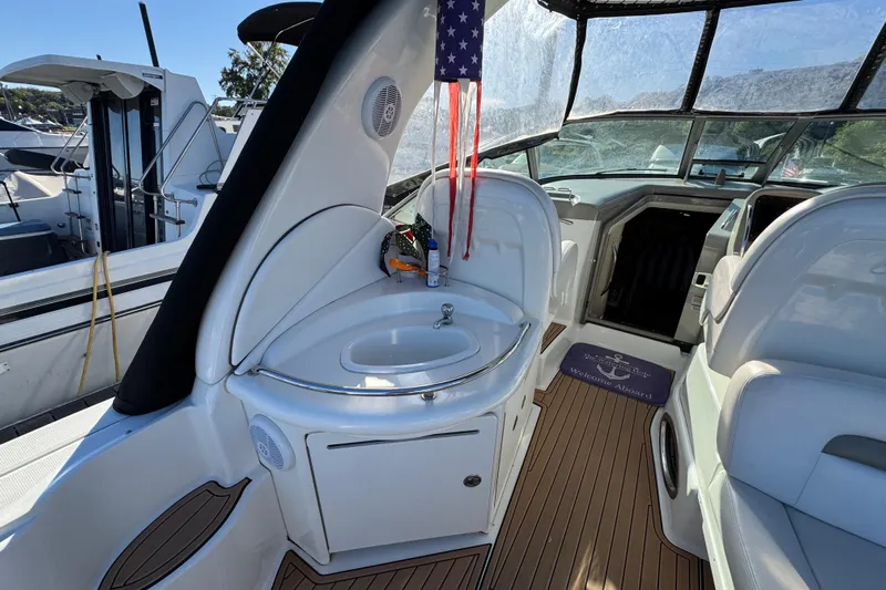  Yacht Photos Pics 2007 Sea Ray 340 Sundancer interior with sink, seating, and welcome mat.