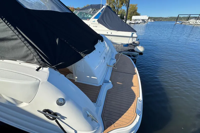  Yacht Photos Pics 2007 Sea Ray 340 Sundancer docked, featuring a sleek design and spacious deck.