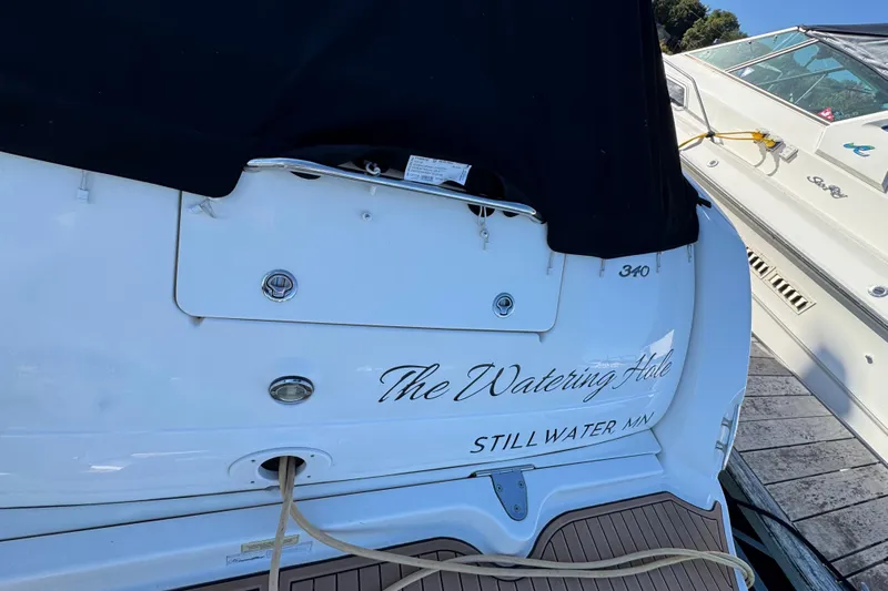  Yacht Photos Pics 2007 Sea Ray 340 Sundancer docked, featuring "The Watering Hole" name and Stillwater, MN location.