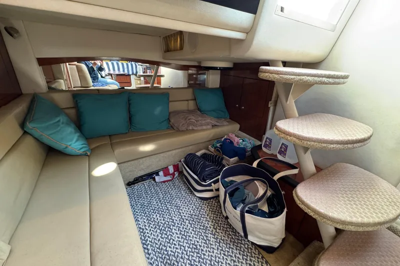  Yacht Photos Pics Interior of 2007 Sea Ray 340 Sundancer with cozy seating and spiral stairs.
