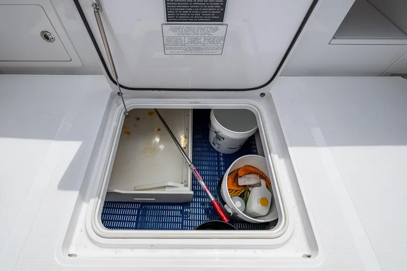 It's Time Yacht Photos Pics Storage compartment on a 2015 Bahama 41 boat with fishing gear and supplies.